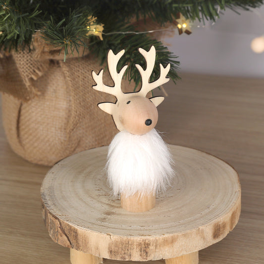 Petit renne en bois avec fourrure artificielle blanche